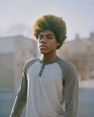 Photo by @elias.williamsTwenty-six-year-old photographer Elias Williams (@elias.williams) works quietly and methodically with his large-format camera, a cumbersome device about the size of a toaster oven. “Visually committing to a space or a person, setting up the camera, getting under the dark cloth, seeing upside down and backwards, focusing a loupe [magnification device] on the ground glass, putting in the film holder, cocking the shutter and pressing the cable release — it all makes for a slow, hands-on and therapeutic process that demands focus,” explains Elias. “Because I’m a very introverted person, the camera itself works as a great icebreaker for first time interactions when making portraits.” These images emerge from a mutual sense of curiosity between the photographer and the photographed, often within blocks of his home in New York City’s South Bronx. “I try to connect with people up to the moment where they allow me to represent just a piece of their complex, true being.”