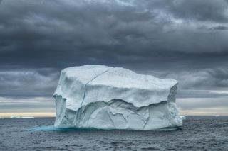 Photo by @CristinaMittermeier // Like a crumbling wedding cake, slowly melting on its way out to sea, an iceberg travels along the northern shore of Baffin Island. Millions of tons of ice are calved every year by the many glaciers that fringe the coast of the Canadian Arctic, making this landscape endlessly fascinating and beautiful.  As long as there is ice, there is hope.  Let’s continue working to change our carbon future so that ice remains a feature of this majestic landscape.To see more image from the newly-protected Lancaster Sound Marine Conservation Area, which will be featured in an upcoming article on @NatGeo Magazine, visit my #instagram feed on @CristinaMittermeier#TurningtheTide with @NatGeo, @NatGeoPristineSeas and @SeaLegacy.@NatGeoCreative | #beauty | #polar | #nature | #photography | #canada| #nature | #mexican